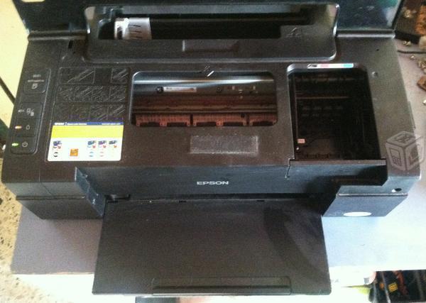 Impresora Epson T40W con cabezal tapado