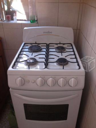 Estufa y lavadora de medio uso oferta