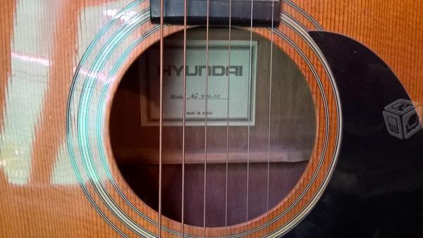 Bonita guitarra electroacústica hyundai