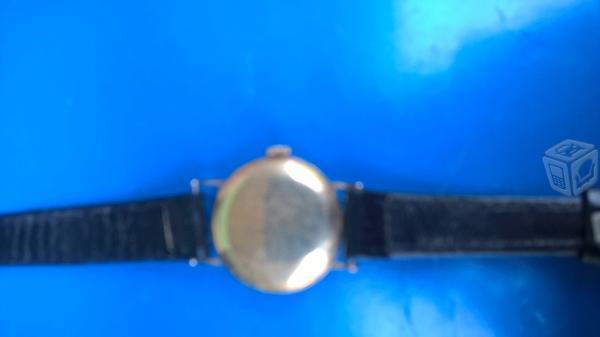 Reloj Movado antiguo cuerda chapa de oro