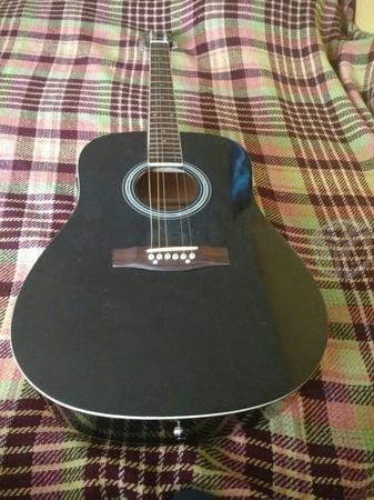 Guitarra con amplificador