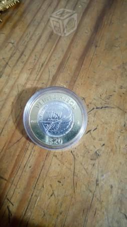 Moneda conmemorativa 100 años F.A.M