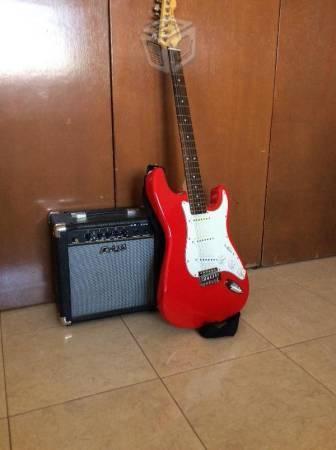 Guitarra eléctrica con amplificador