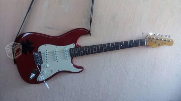 guitarra como nueva con amplificador