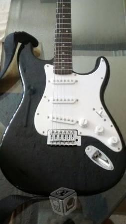 Guitarra Squier Fender y amplificador
