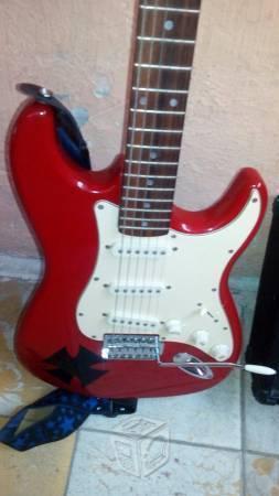 guitarra electrica con su ampli