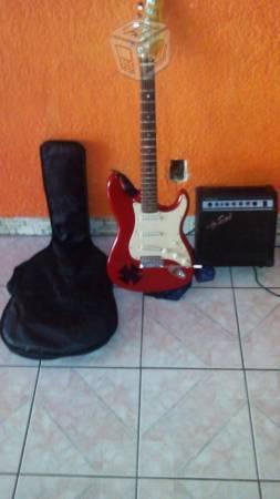 guitarra electrica con su ampli