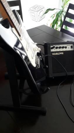Conjunto de guitarra, amplificador, base y cable