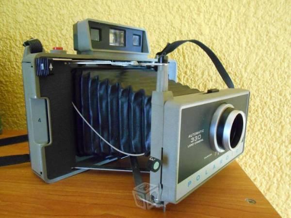 Preciosa cámara polaroid 330 retro