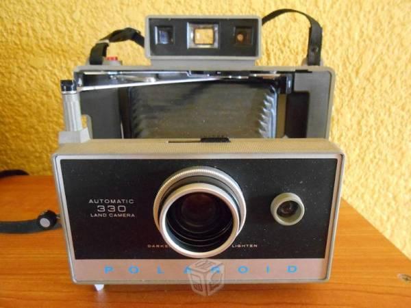Preciosa cámara polaroid 330 retro