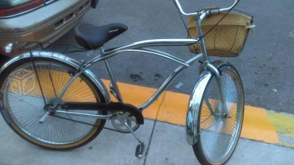 Bicicleta tipo vintage cromada
