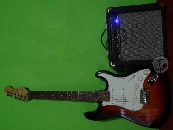 Guitarra Eléctrica y Amplificador Cruiser