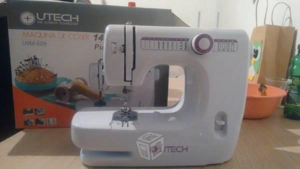 Máquina de coser marca utech