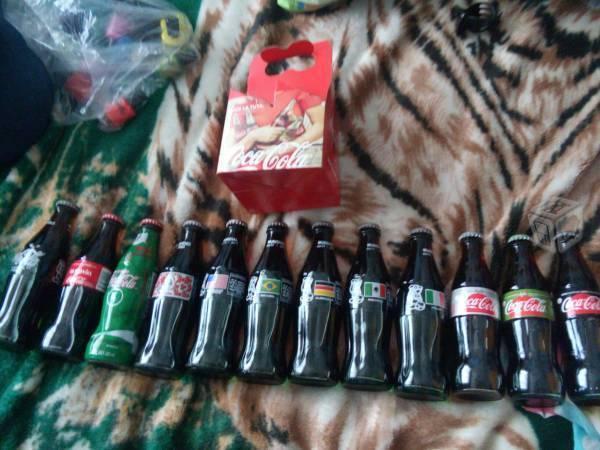 Busco: Coca-Colas de 250ml tapadas