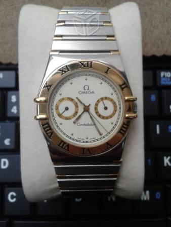 Reloj omega en oro18k con acero calendografo