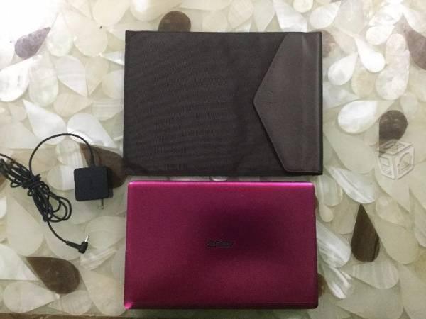 Laptop Asus color rosa extraplana 12 pulgadas